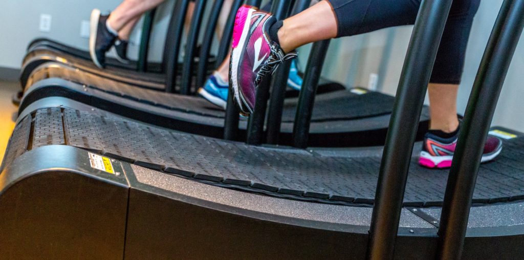 Non-motorized curved treadmill